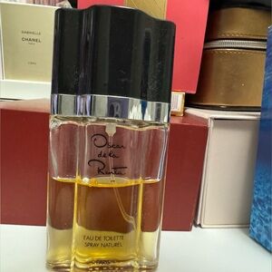 Oscar de la Renta for Her half full